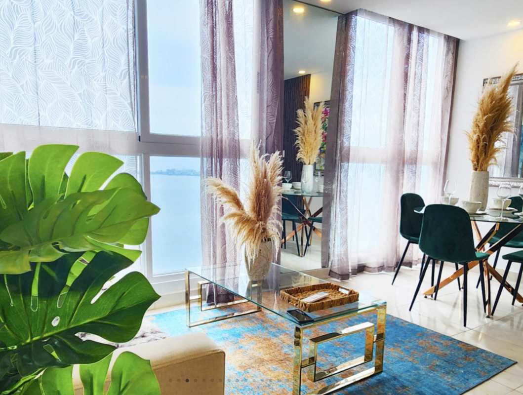 Modern living dining open space large windows waterfront view PH The Sands Panama City