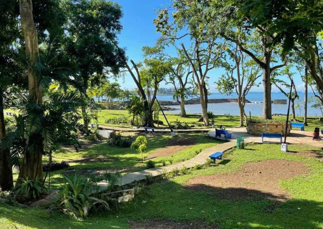 Covered patio terrace with ceiling fans and skylights, mid-century style, oceanfront Punta Paitilla Panama