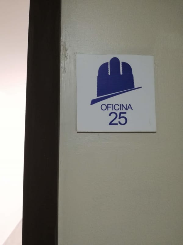 Entrance signage indicating Office 25 in PH Bay View Tower Panama City Business District