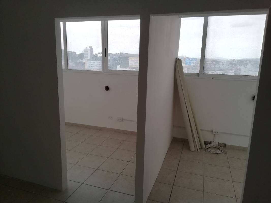 Glass enclosed balcony or utility area with cityscape views PH Bay View Tower Panama