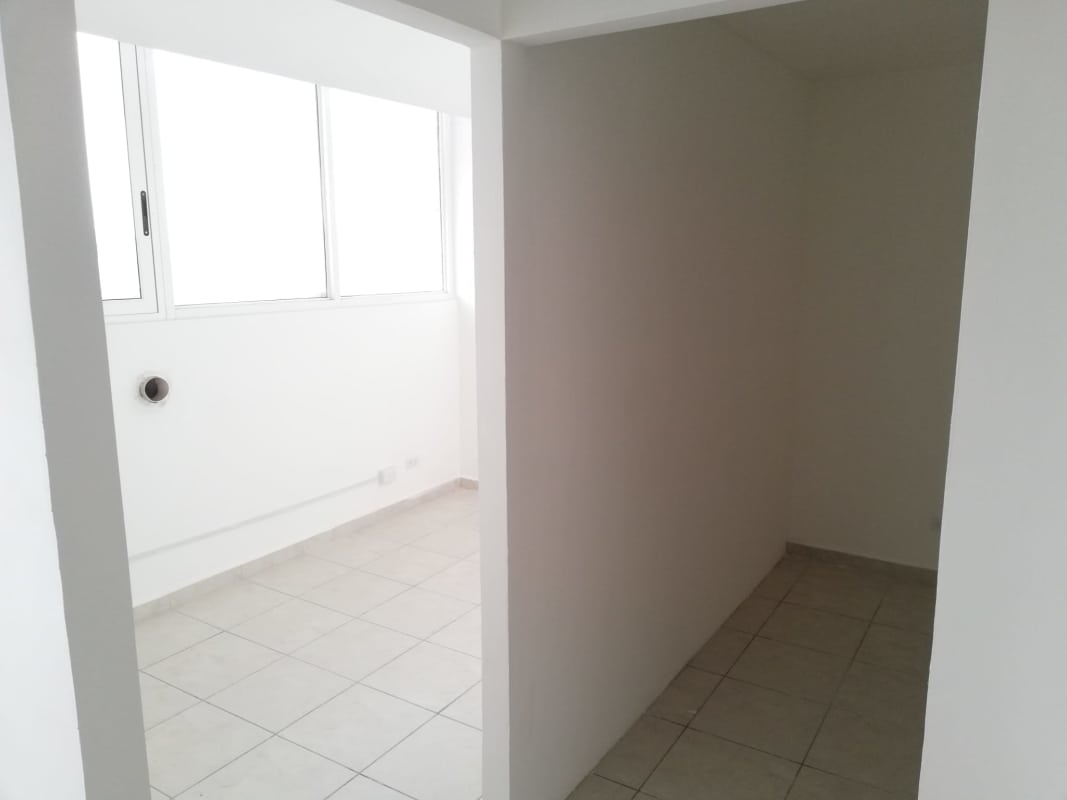 Utility or storage room with large window inside commercial office PH Bay View in Panama City