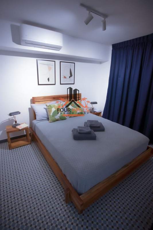 Furnished bedroom with queen bed, closet, AC in PH Plaza Santa Ana Casco Viejo Panama