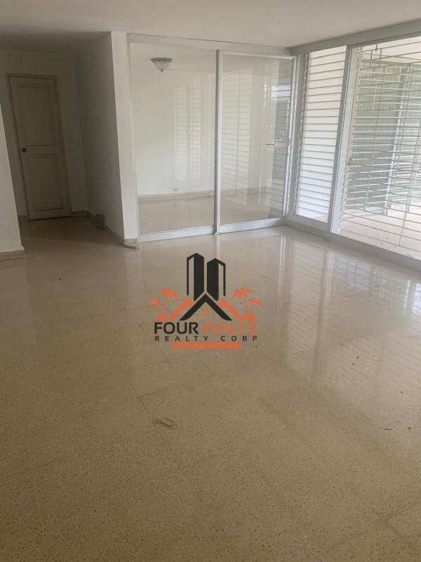 Ample laundry space with utility sink and white cabinetry at PH Fiesta Obarrio Panama