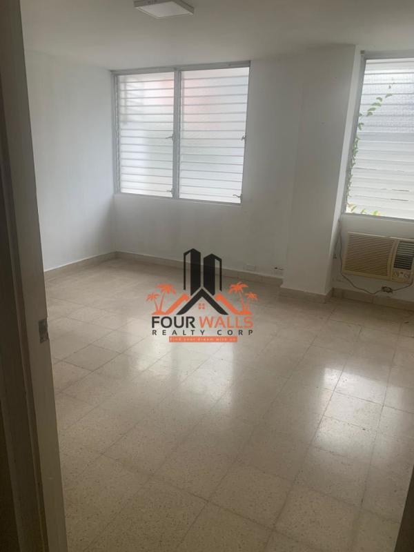 Spacious living room with large windows and terrace access at PH Fiesta Obarrio