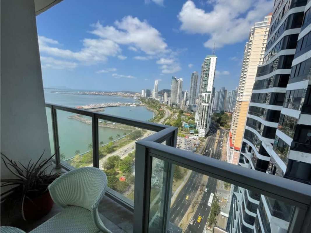 Balcony view over city skyline and Pacific Ocean from Yoo Panama