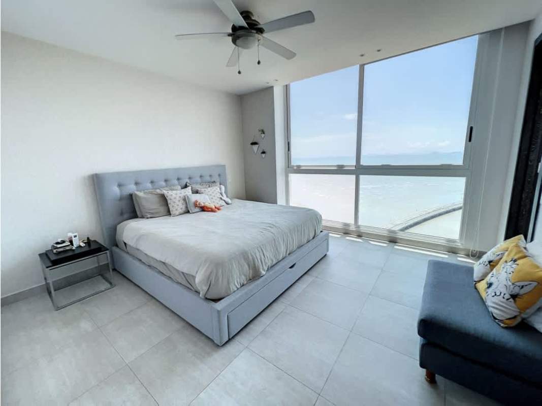 Bright modern bedroom with city and ocean views in PH Asia Costa del Este Panama