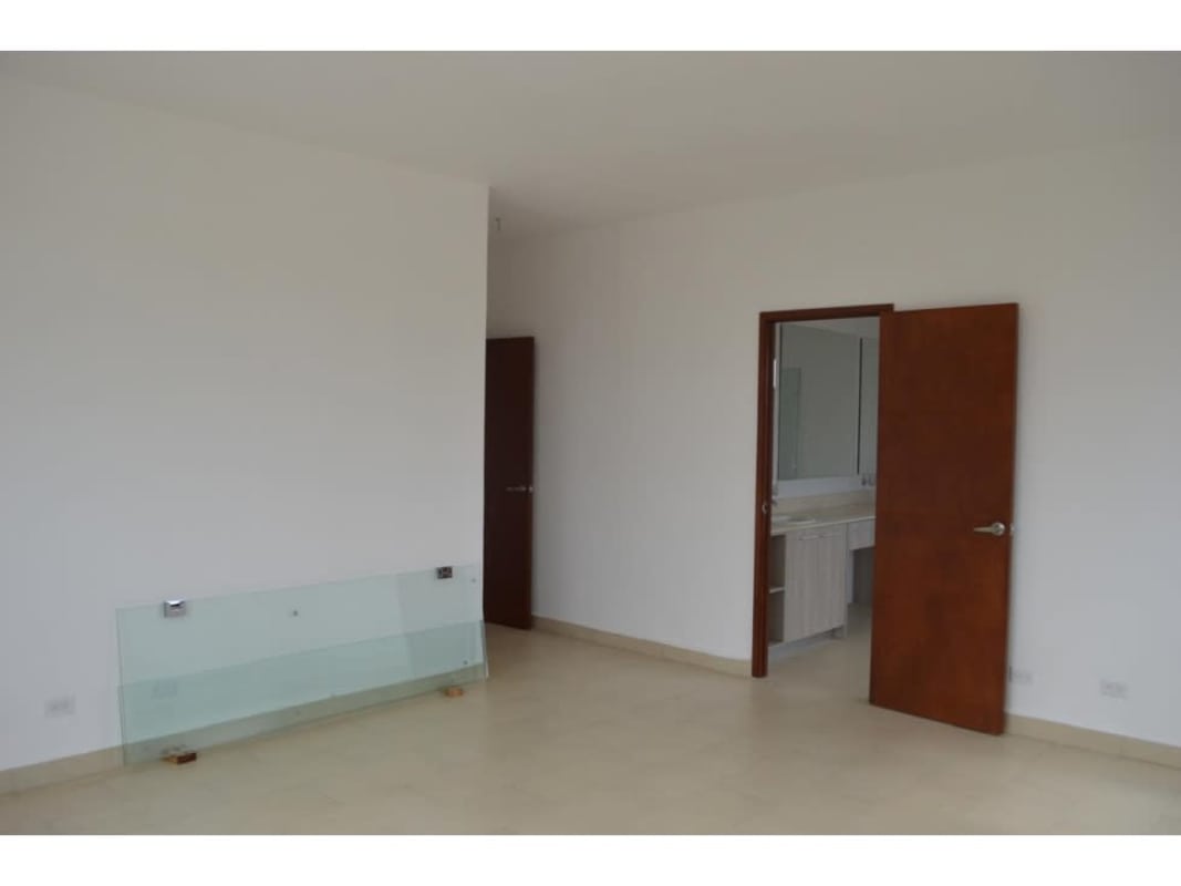 Contemporary kitchen with bay window and granite countertops in PH El Doral Costa Sur Panama house for sale