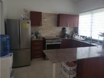 Bedroom with bunk beds and turquoise curtains Piedras Gordas beach house Panama