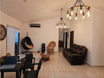 Bedroom with TV and built-in wardrobes in beach rental PH Piedras Gordas Villages Panama