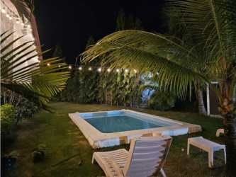 Covered patio with hammock, garden swing, lush backyard in PH Piedras Gordas San Carlos Panama