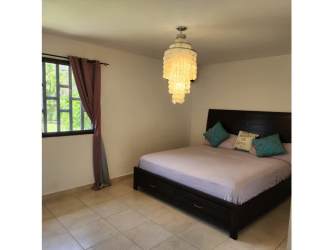 Night lit backyard, pool, tropical garden PH Piedras Gordas Villages Panama