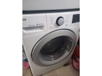 Laundry room with front load washer in beach house PH Piedras Gordas Villages San Carlos Panama