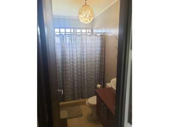 Contemporary style bathroom with shower, toilet, and sink in PH Piedras Gordas Villages Panama