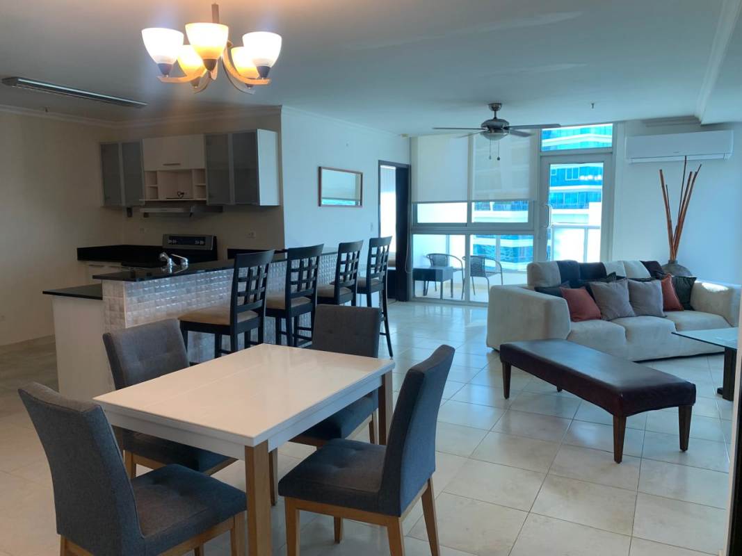 Bedroom with panoramic windows, river city views, ensuite bath in PH Riverside Costa del Este