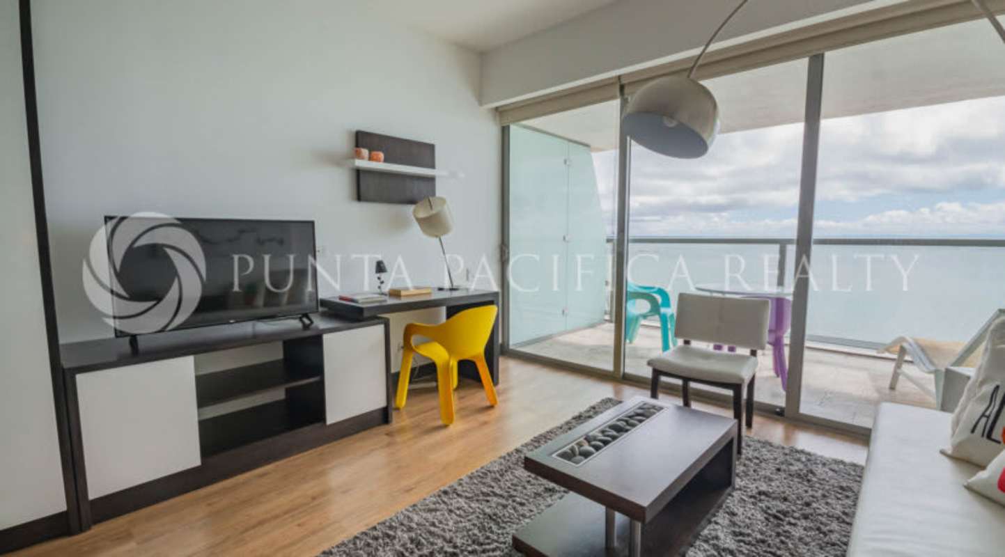 Studio living space with large windows and ocean view in The Ocean Club Punta Pacifica Panama