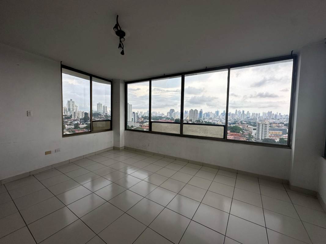Large windows city skyline view in empty living room PH Beverly Hills Betania Panama