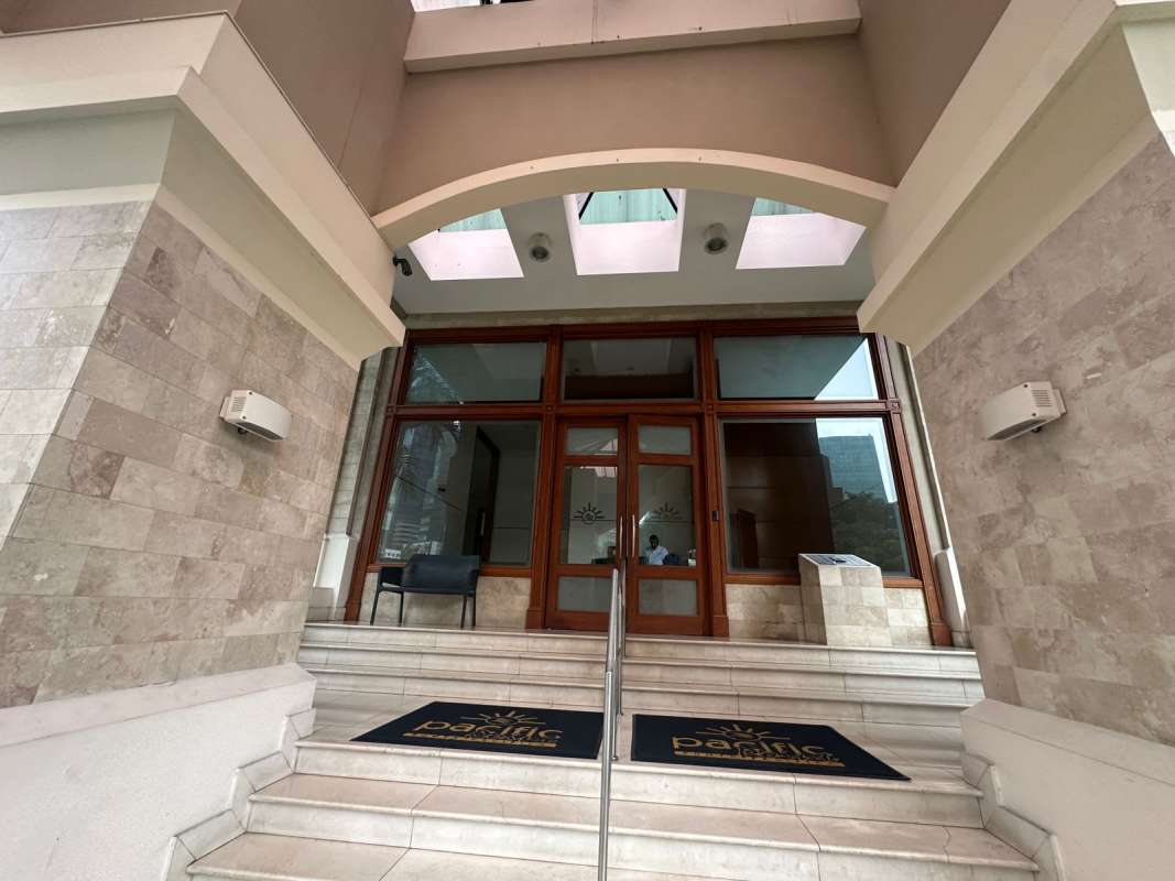 Luxury marble lobby with seating areas at Pacific Point Tower Punta Pacifica Panama City