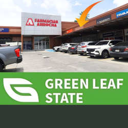 Parking area and storefronts in commercial plaza Downtown David Chiriquí