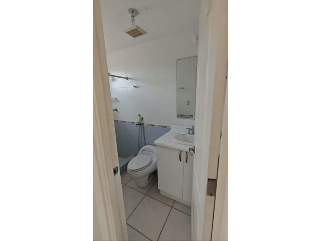 Tiled living room space with access to stairs and ample natural light Brisas del Golf Panama