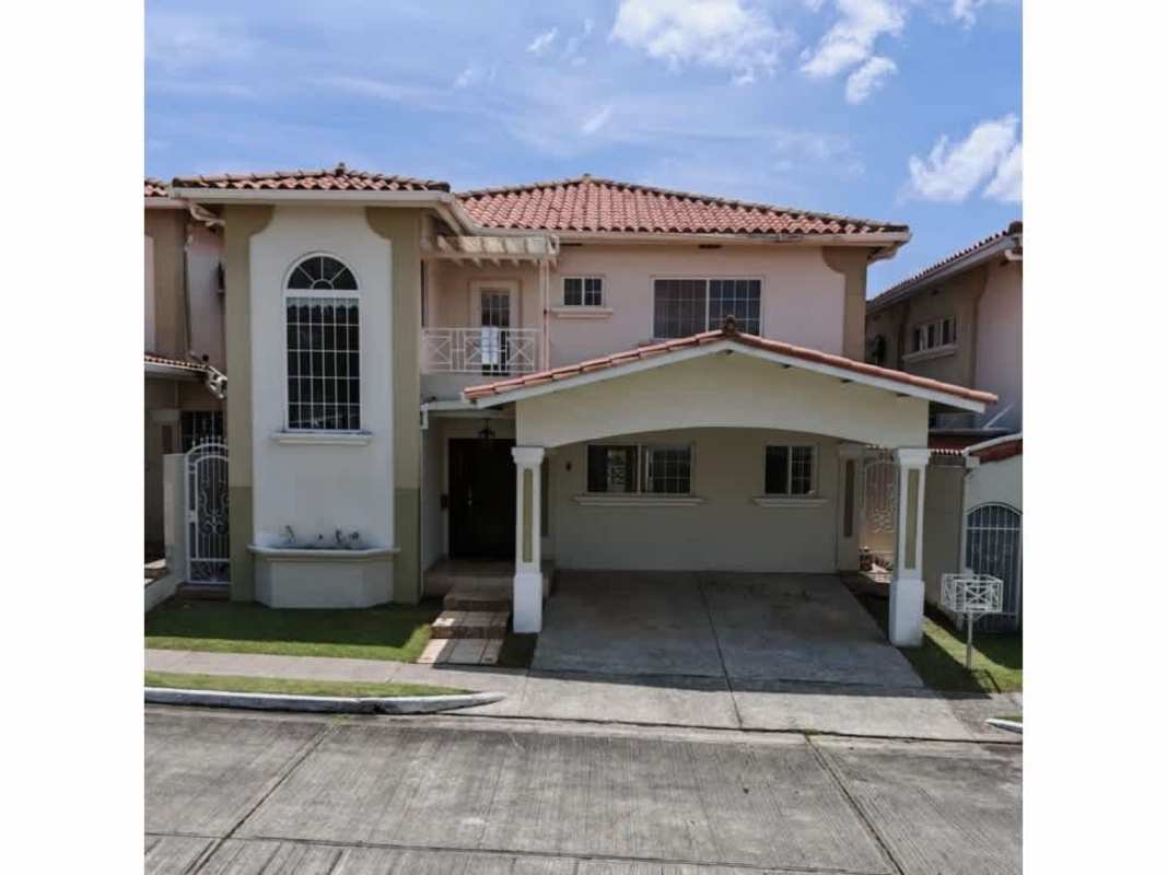 View of covered side balcony terrace overlooking neighborhood park Brisas del Golf Panama