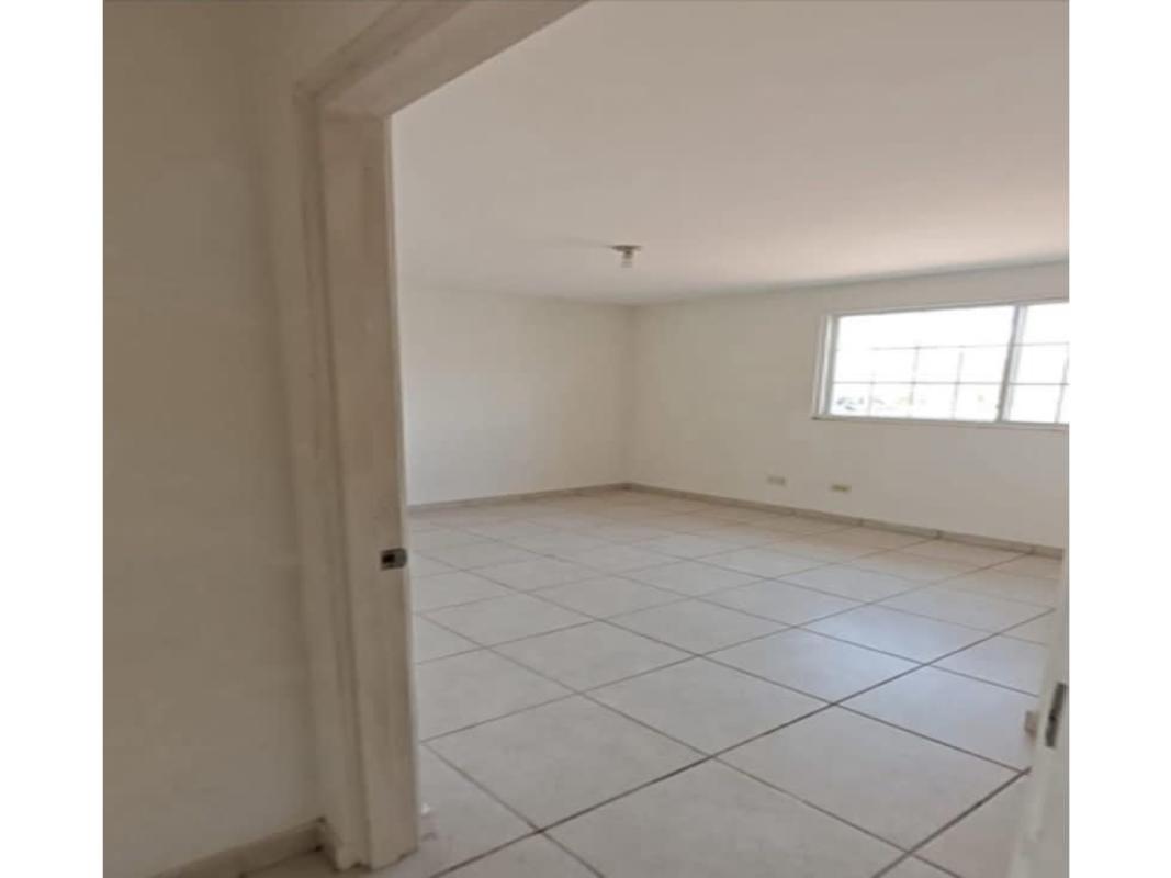 Empty bedroom with big window bringing natural light in Brisas del Golf house Panama