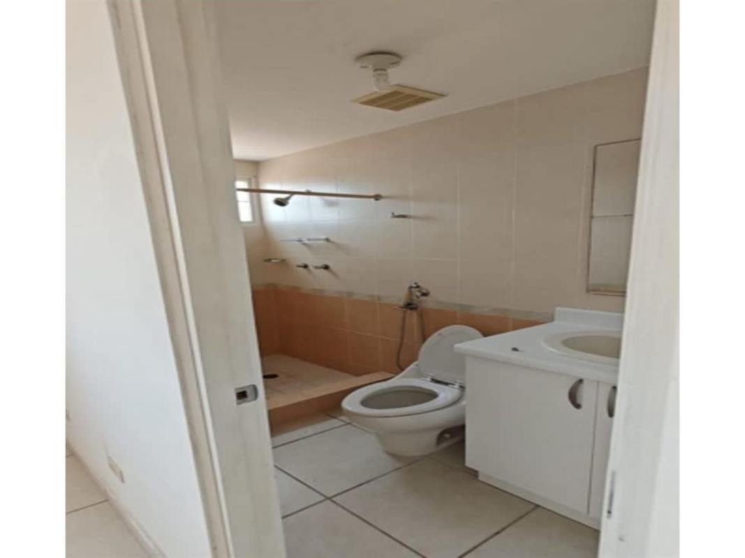 Functional bathroom with shower and vanity in Brisas del Golf house Panama
