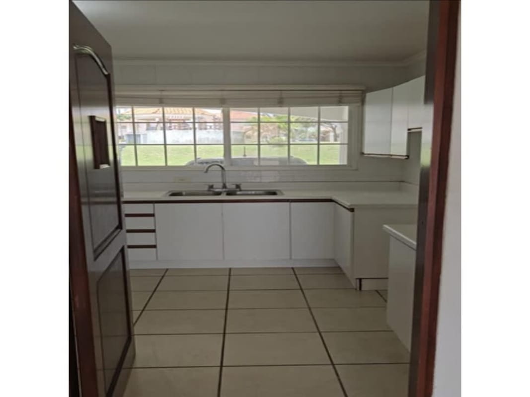 Two-story Mediterranean style house with balcony and driveway in Brisas del Golf Panama