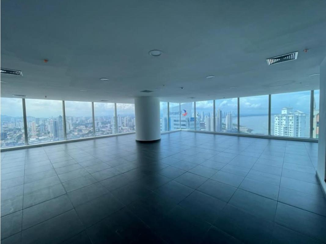 Bright empty office interior with panoramic glass walls at Oceania Business Plaza Tower 100 Panama City