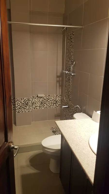 Mediterranean-style multi-level home with terracotta roof, tropical garden, in Clayton Panama