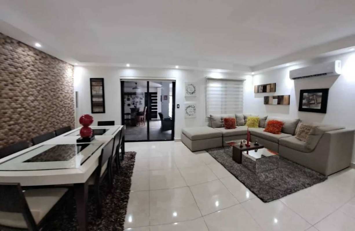 Elegant open living dining with sectional sofa, accent wall in PH Versalles Don Bosco Panama City