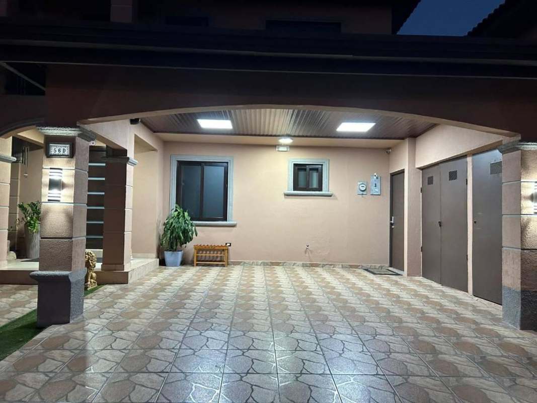 Covered carport space with tiled floor, contemporary exterior PH Versalles Don Bosco Panama City