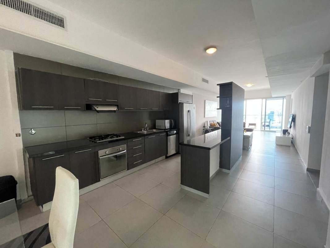 Aerial view of Yacht Club Tower on Avenida Balboa with ocean skyline and marina