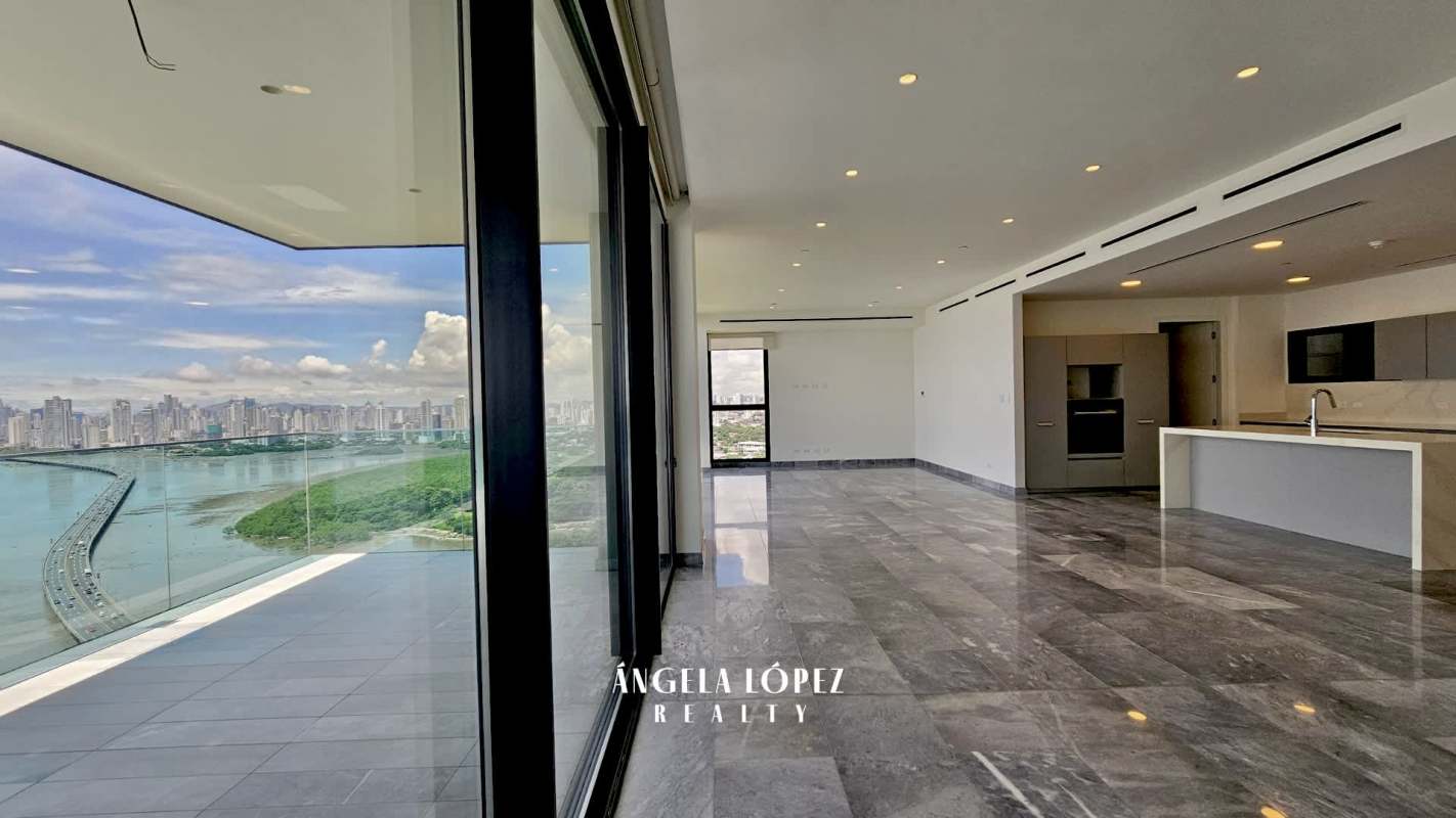 Spacious bedroom marble floors ensuite bathroom panoramic ocean city views PH Upper East Costa del Este Panama