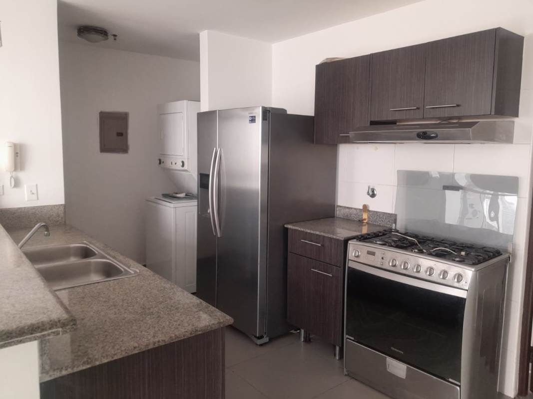 Bedroom with city skyline and ocean views, large window, PH Colores de Bella Vista Avenida Balboa Panama