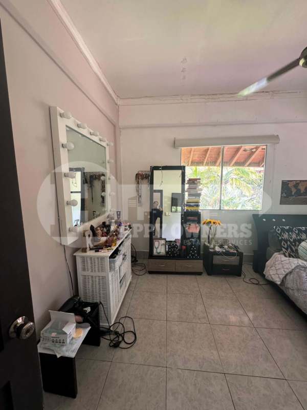 Bedroom with tile floors, ceiling fan, and closet in PH Albrook Park Clayton Panama