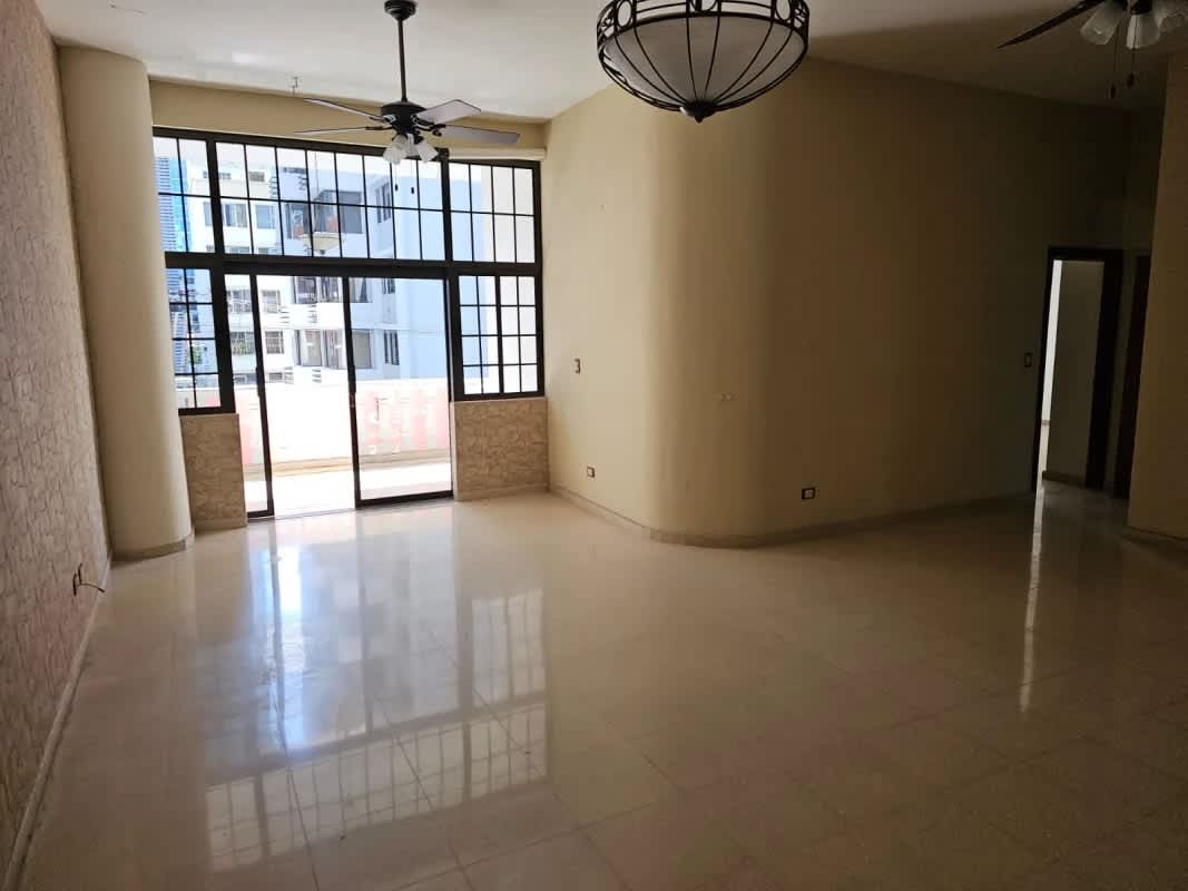 Spacious loft apartment interior with large windows, tile floors at PH Ariadne San Francisco Panama