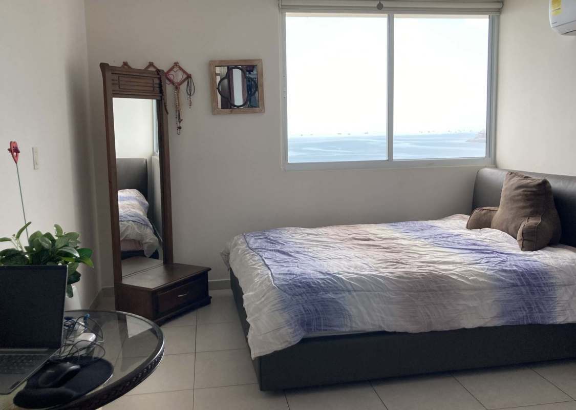 Open-plan family living room with play area balcony ocean view PH Terramar Panama City