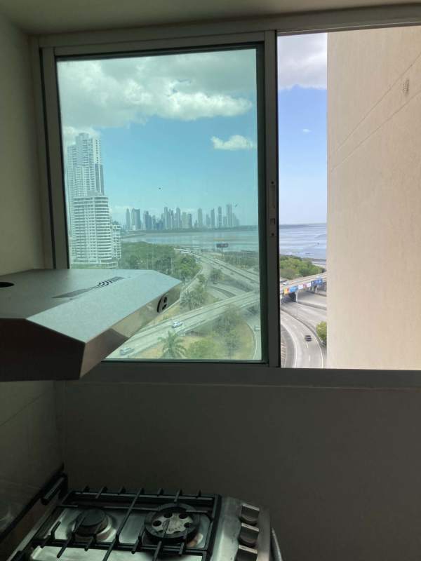 Minimalist bedroom with ocean window, AC, modern furnishings PH Terramar Panama