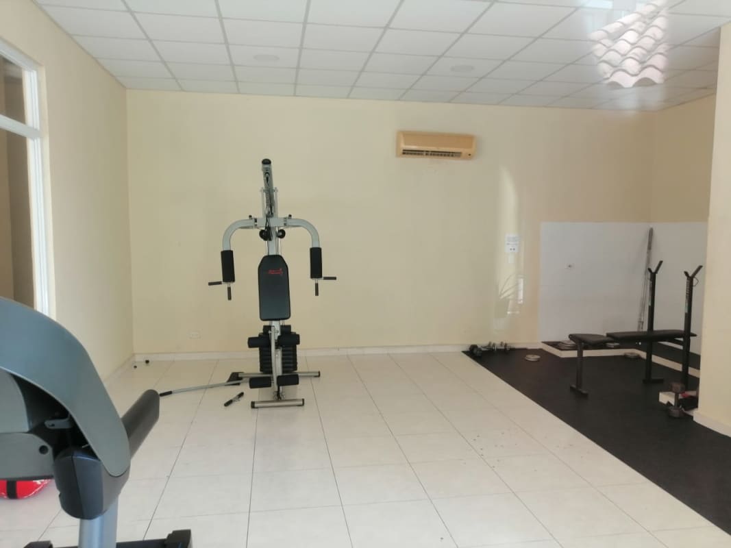 Gym with treadmills, weights, and machines in PH Marquez San Miguelito Panama