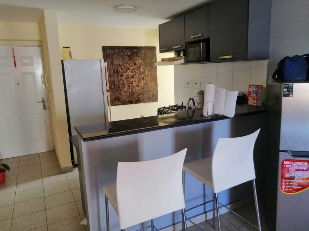 Shared terrace with Mediterranean gazebo roof, planters overlooking city at PH Marquez Via España