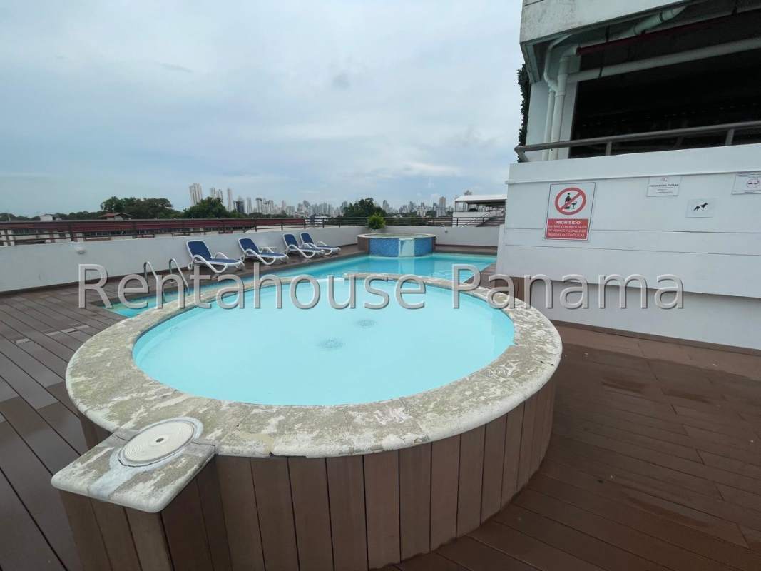 Contemporary living-dining room with wood floors, sectional sofa and balcony view PH Lefevre 75 Panama
