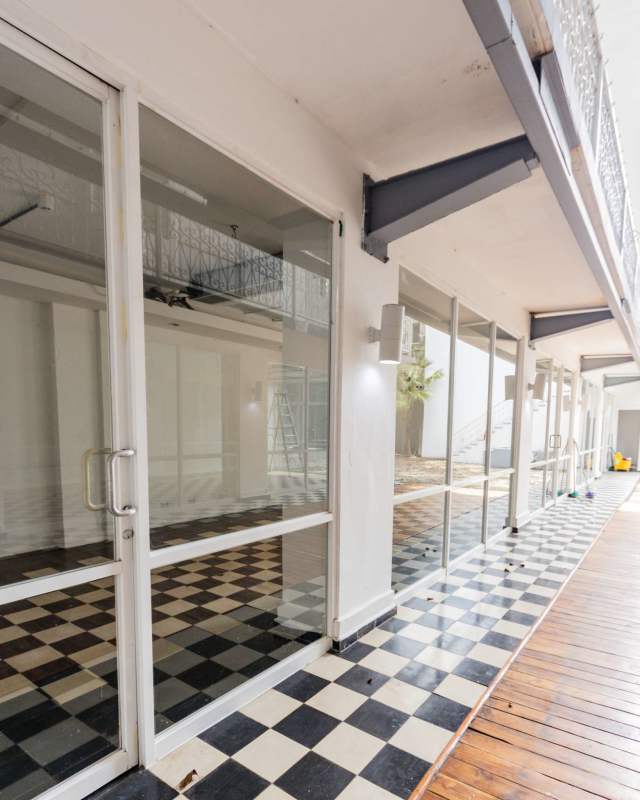 Exterior colonial facade with ornate balconies and large windows in Casco Viejo commercial lease building Panama