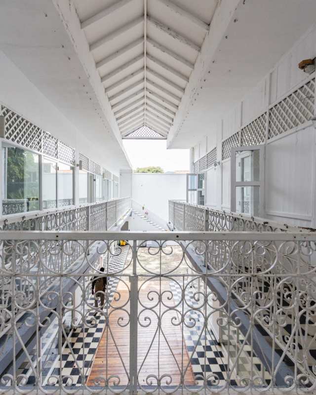 Historic two-story colonial commercial building with balconies Casco Viejo Panama City