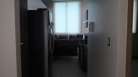 Dining area with large windows ocean view Santa Clara beachfront condo