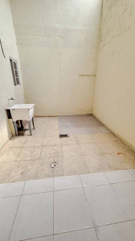 Covered laundry with utility sink tiled floor Villas del Naranjal Pedregal Panama