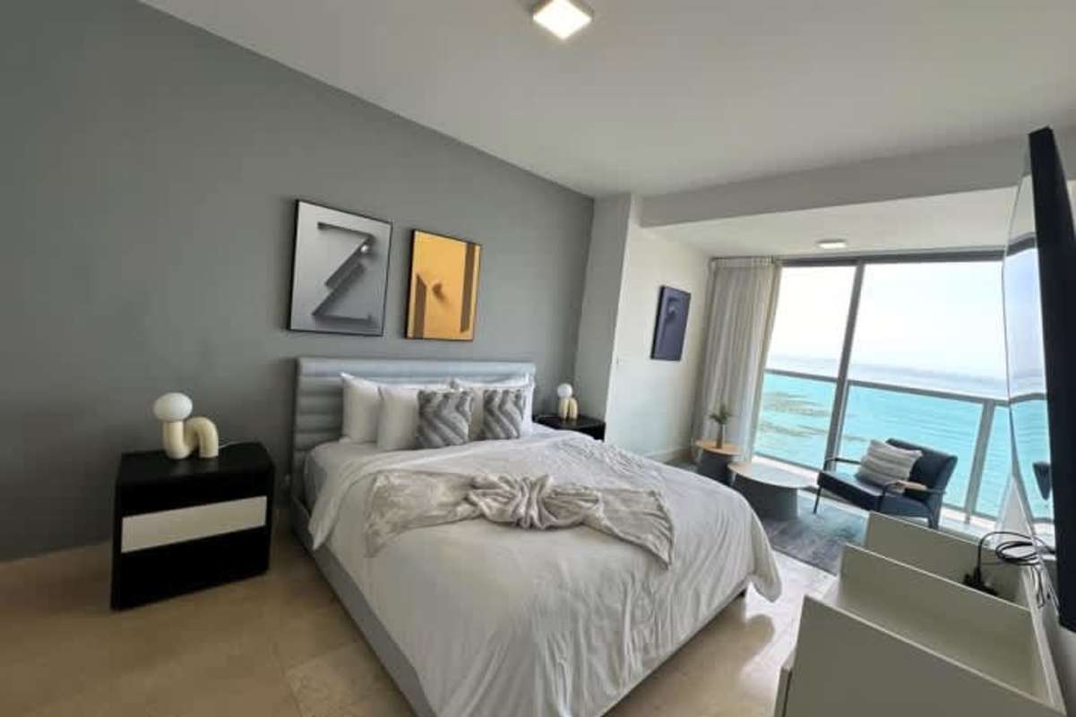 Luxurious bathroom with marble accents and double vessel sinks Yoo Panama Panama City