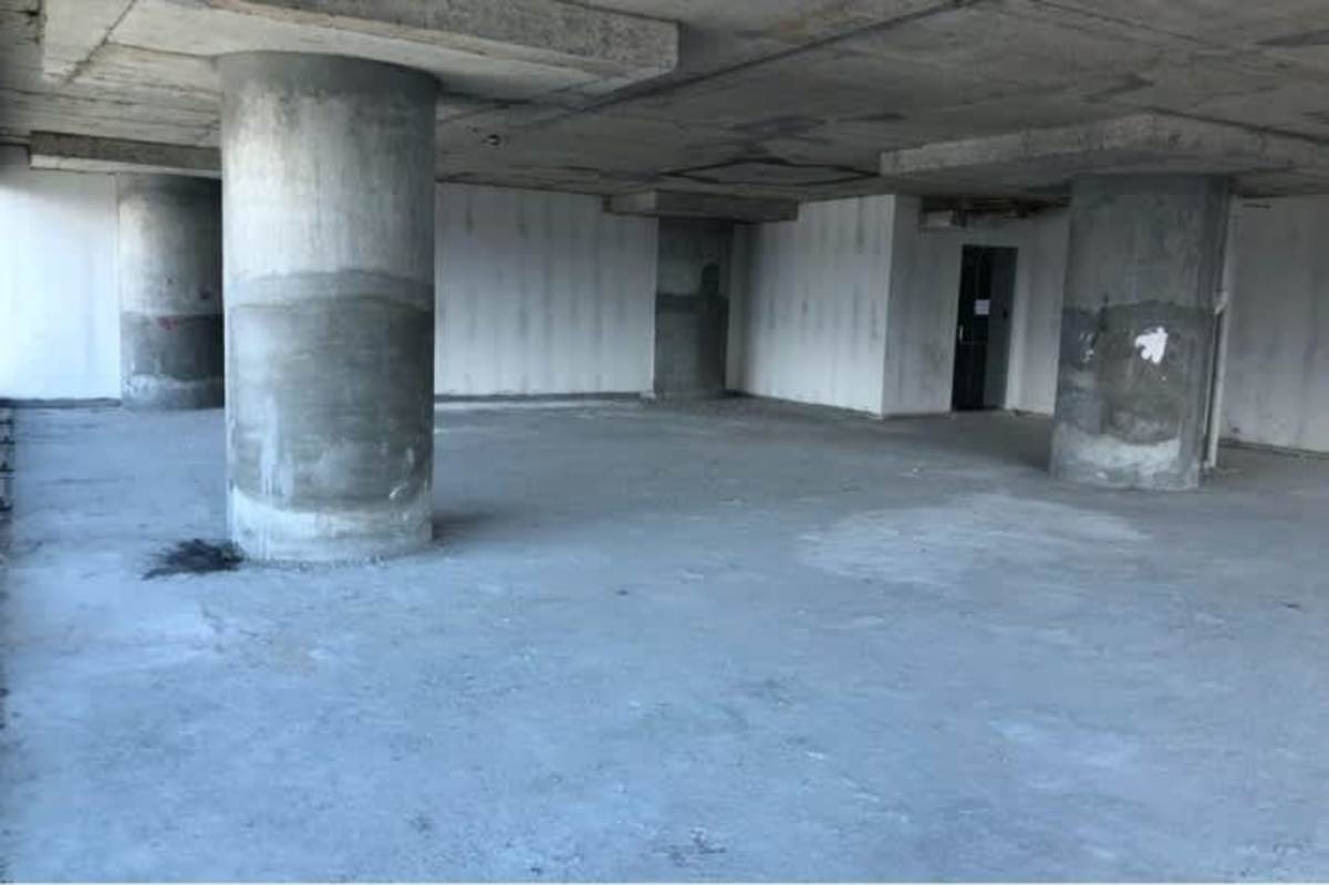 Open unfinished shell interior with exposed concrete in Oceania Business Plaza Punta Pacífica Panama City
