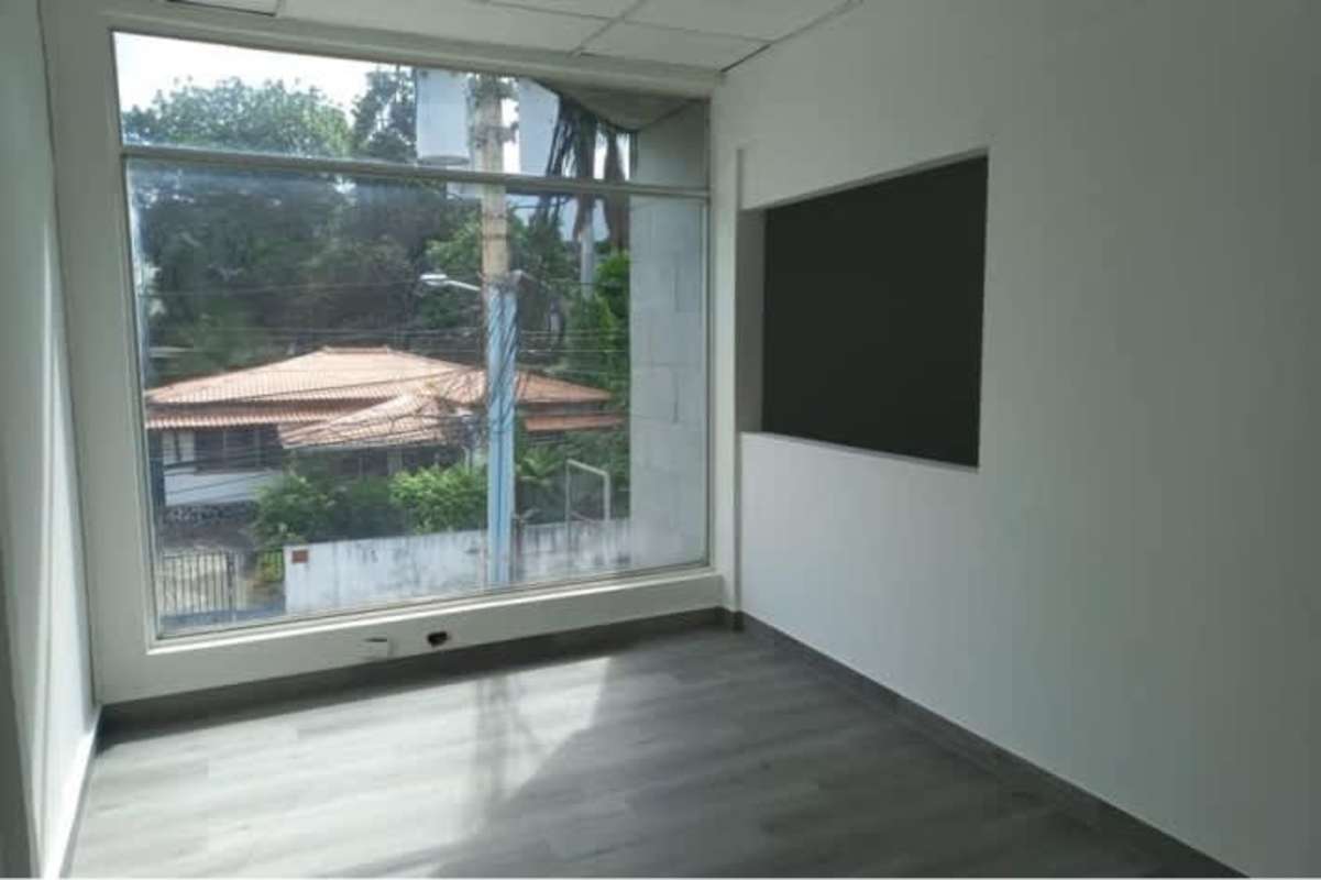 Glass enclosed private workspace overlooking Panama Bay in BICSA Financial Center