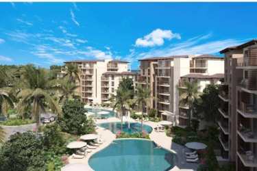 Minimalist bedroom with large window and bright decor in oceanfront condo Costa Chame Panama