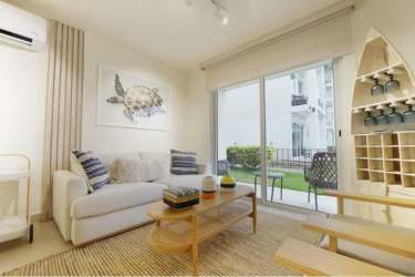 Aerial beachfront complex Costa Chame with swimming pools, landscaping, ocean view apartments Panama